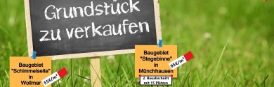 Schild mit dem Text Grundstück zu verkaufen
